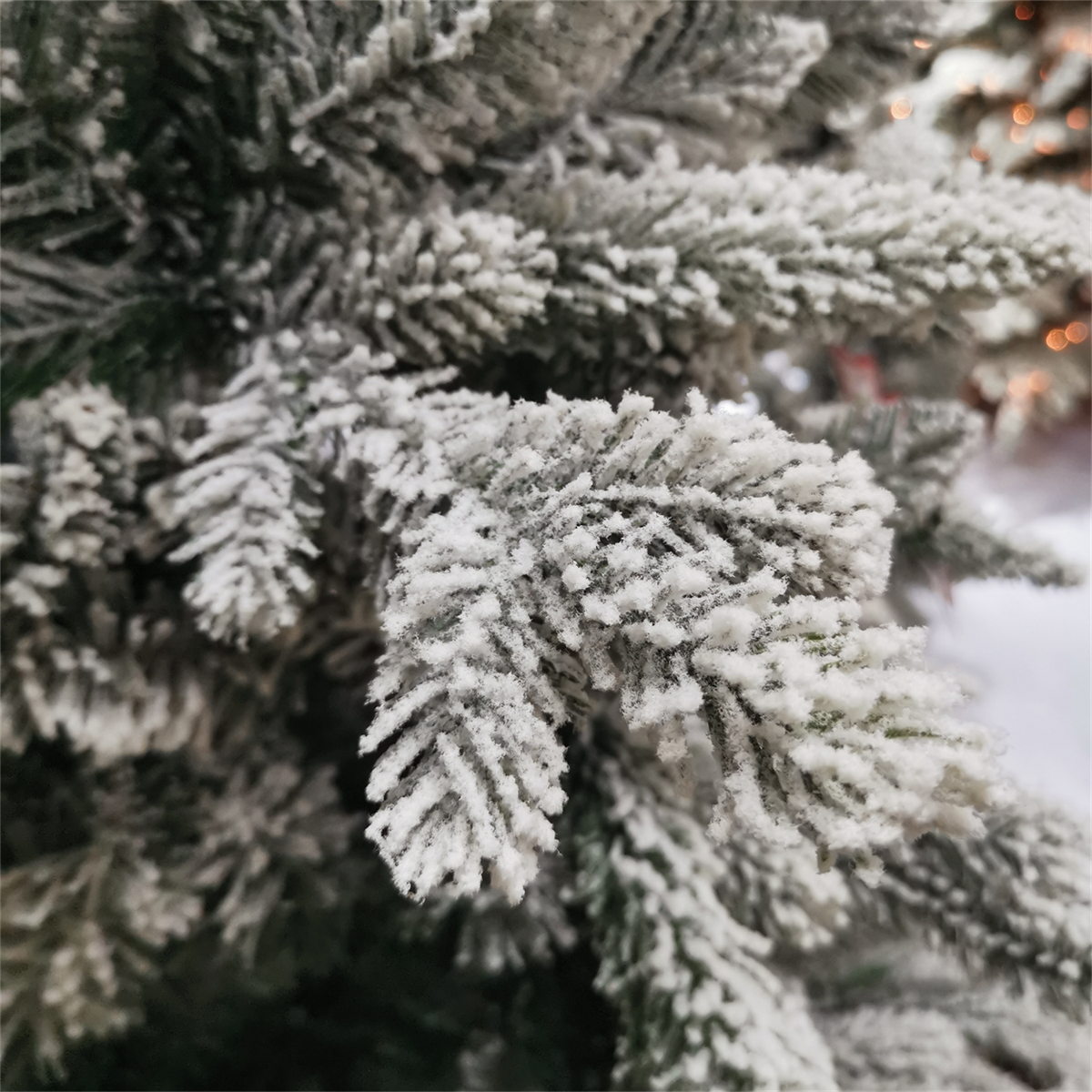 Flocked Cedar Artificial Christmas Tree with Snowy White Branches