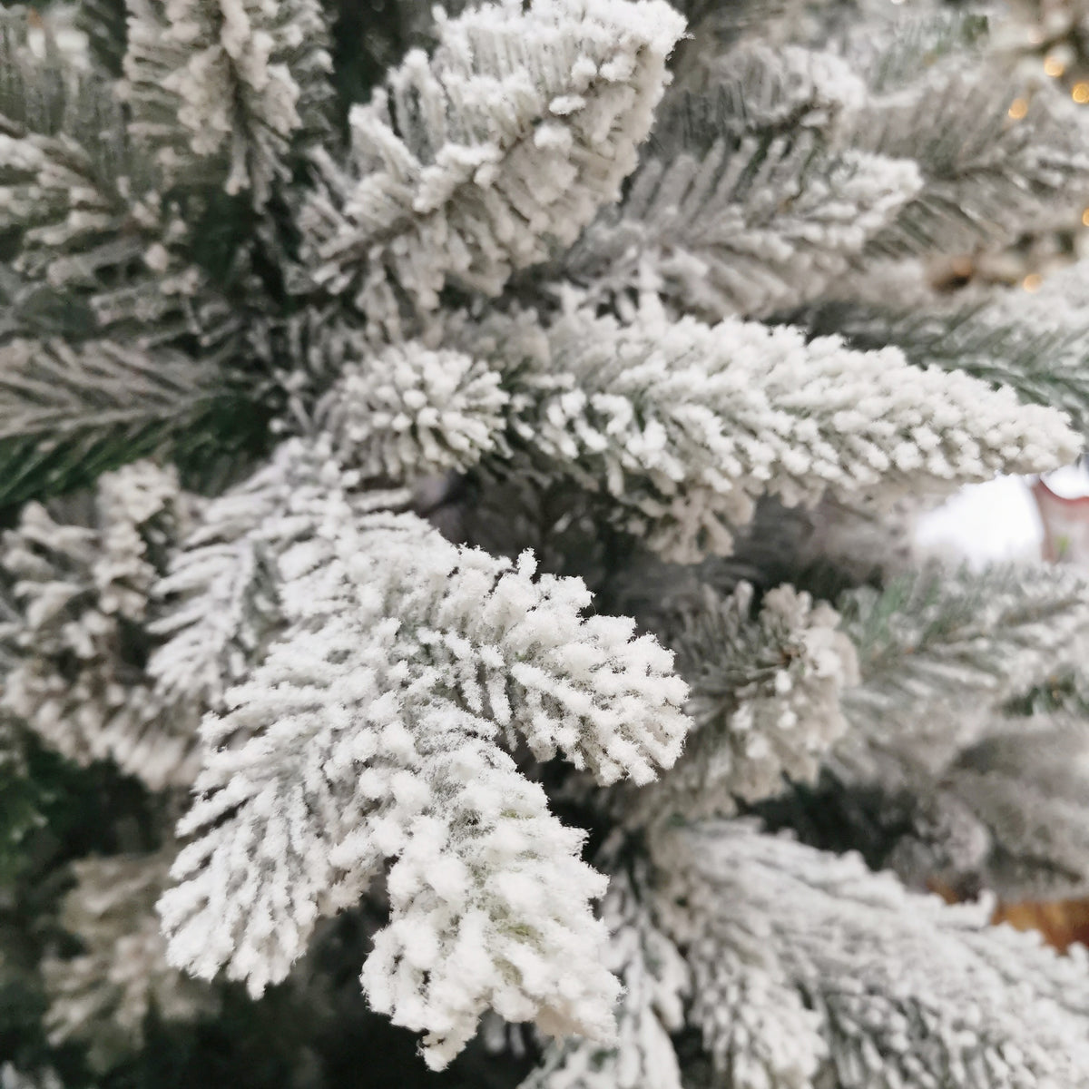 Flocked Cedar Artificial Christmas Tree with Snowy White Branches