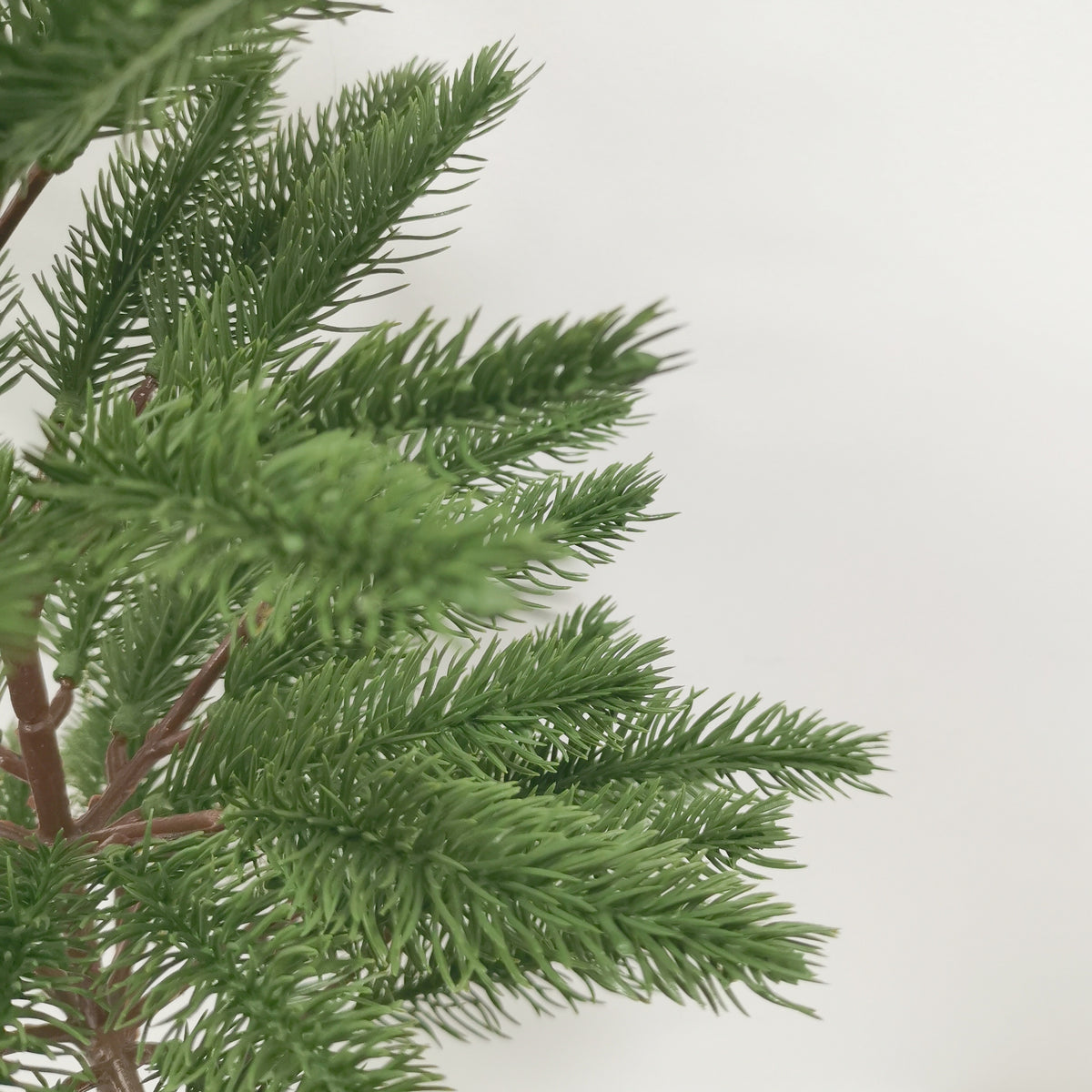 Nordic Pine Artificial Christmas Tree with Natural Green Branches and Decorative Pot